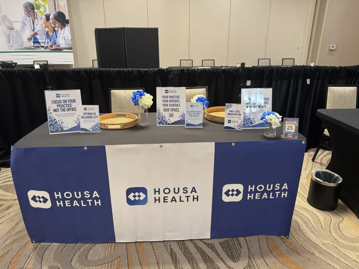 Housa Health signage and booth display at the OAPA annual conference